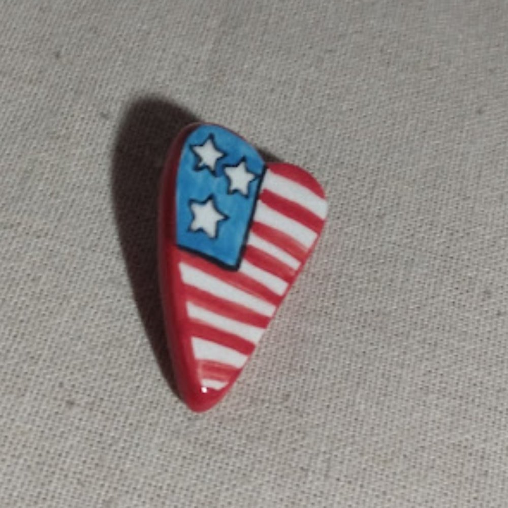 Silvestri: Red, white, and blue heart shaped lapel pin